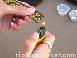 Only for synthetics. Be careful not to set the ribbon on fire!